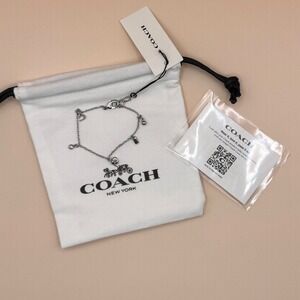 Coach Silver Tone Multi Charm Bracelet Horseshoe Heart Crystal 573869RH0030